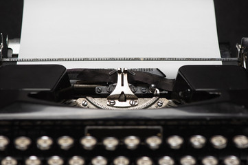 typewriter with paper sheet