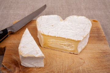Neufchatel, French cheese made from cow's milk produced in Normandy