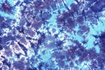 tie dye pattern hand dyed on cotton fabric abstract texture background.