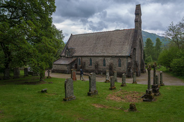 Fototapeta na wymiar Cemetery of the Balquhidder Parish church, Lochearnehed, Scotland. Concept: religion and spirituality, mysterious and fantastic places in scotland