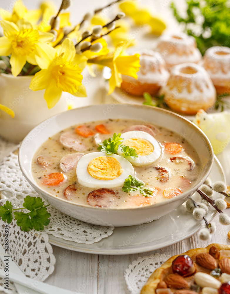 Wall mural the sour soup (żurek) polish easter soup with the addition of sausage, hard boiled egg and vegetable