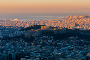 ATHENS, GREECE, December 22, 2013: Parthenon and Acropolis at dawn at different heights of the sun,...