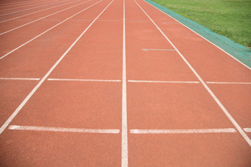 Fototapeta premium Red rubber track on the playground