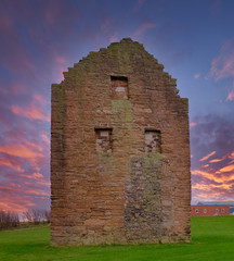 Auchenharvie Colliery Engine House  Front Elevation Remains Stevenston North Ayrshire Scotland at Siunset end of the day with a blazing red sky.