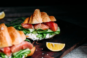 Croissant with salmon, cream cheese and lettuce