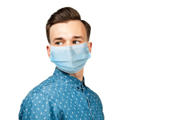 Sick guy looking at the camera with a surprised medical mask. Virus protection during influenza epidemic. corona virus