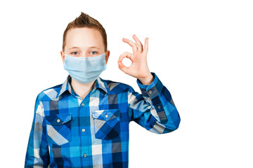 boy show the OK sign, wearing protective face mask prevent virus infection or pollution on white isolated background
