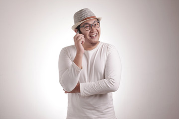Young Man Talking on his Phone, Happy Smiling Laughing