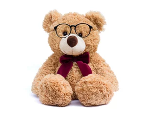 Fotobehang Brown teddy bear with eye glasses  isolated on white background. © NIKCOA