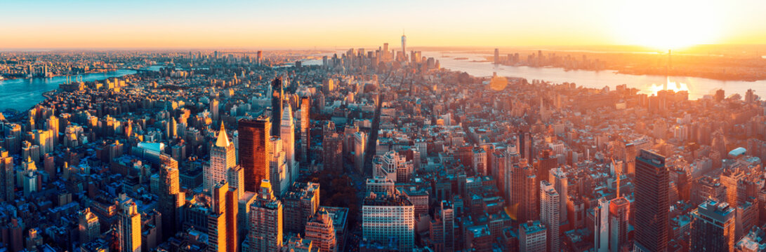 Amazing aerial panoramic view of Manhattan wit sunset