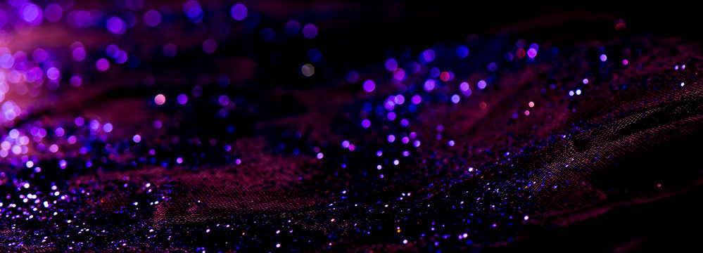 bokeh purple glitter texture christmas abstract background or with blank space