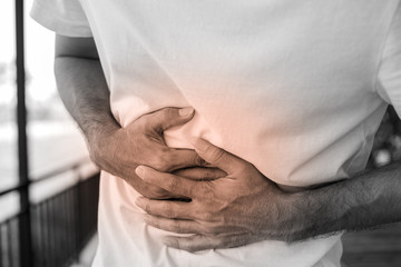 Man suffering from stomach ache