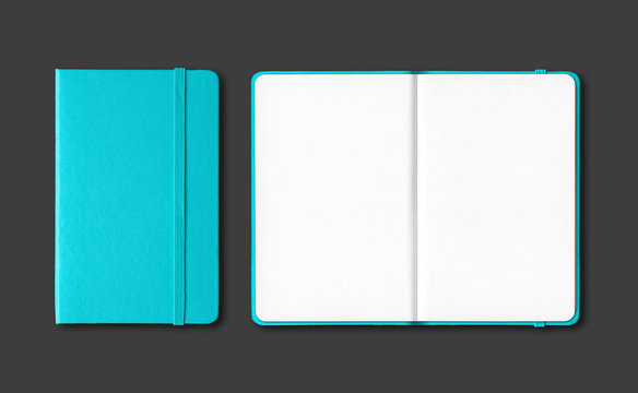 Aqua blue closed and open notebooks isolated on black
