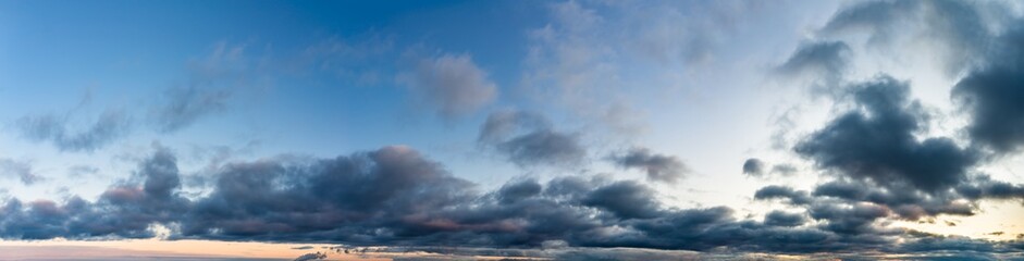 Fantastic dark thunderclouds at sunrise