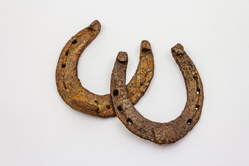 Cast iron metal horse horseshoes isolated on white background