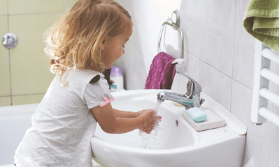 Child Washing Hands With Soap Hygiene Concept