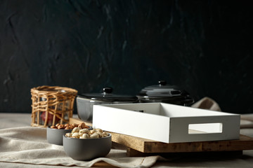 Easter table covered with a tablecloth with a free space for an advertising product