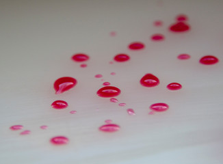 Red blood drops on the white