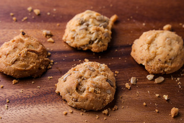 Cookies is on wooden plate. Close up
