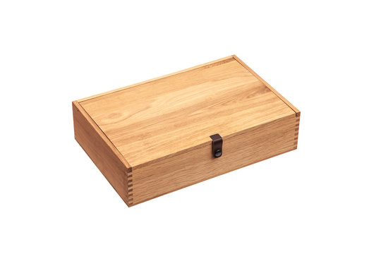 Wooden box with a lid isolate on a white back. Packaging for an expensive gift. New box made of light wood.