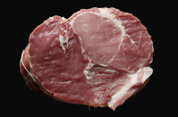 Photography of a piece of pork shoulder ready to be roasted isolated on black