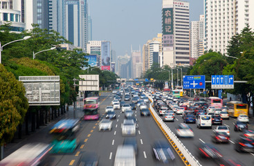 heavy traffic on Shenzhen highway with road signs