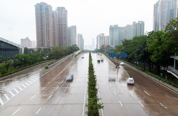 Shenzhen cars drive along Futian district road