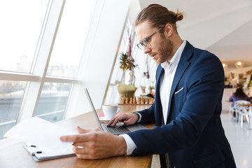 Serious concentrated young businessman