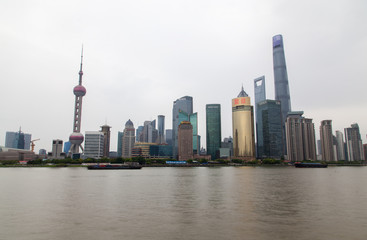 Fototapeta na wymiar Shanghai Huangpu river reflecting Pudong New Area 