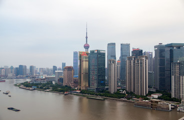 Obraz premium Huangpu river of Shanghai reflects Pudong New Area 