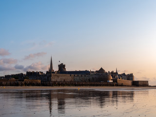 Fototapeta premium A beautiful city St-Malo, Brittany, by the sunset.