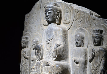 Fototapeta na wymiar Ancient Chinese stone Buddha