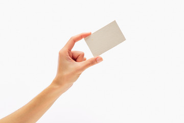 Empty paper card in woman hand