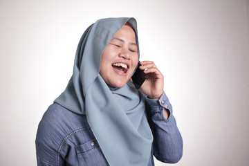 Muslim Lady Talking on Phone, Smiling Expression