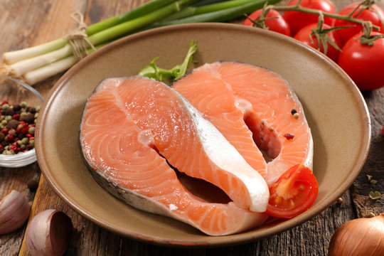raw salmon steak with ingredient