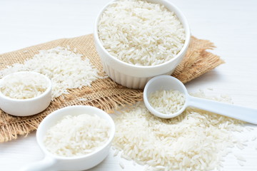Fototapeta na wymiar Natural raw white rice grains, on display in bowl