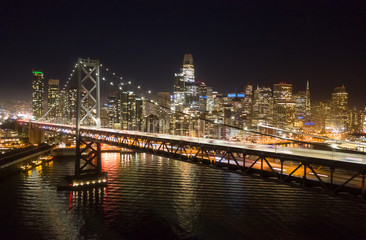San Francisco downtown buildings skyline night bay bridge