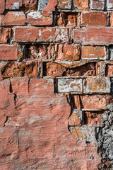 Old red brick wall, grunge vertical background.
