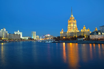 High-rise buildings on the embankment of the Moscow river in the evening. Russia, Moscow, February 2012
