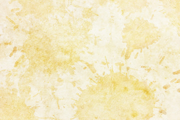 Coffee stains background. Yellow splash texture. Brown antique rustic stained paper backdrop....