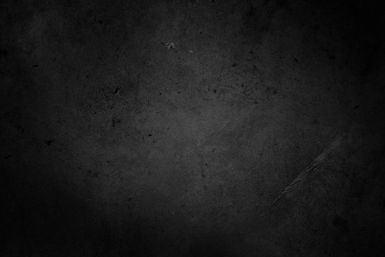 Dark grunge black textured concrete background
