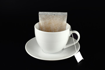 Dip Coffee in white cup with dark background