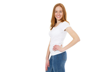 Fototapeta premium Beautiful Scandinavian smile lady girl stands with on a white background with a hand on a belt