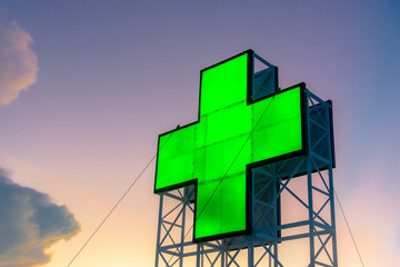 Hospital cross sign on top of the building