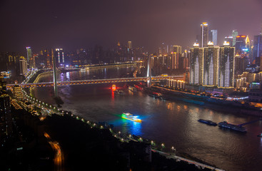 Fototapeta na wymiar Night Yangtze river among Chongqing city in China 
