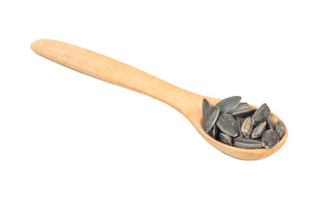Sunflower seeds in a spoon