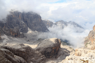 Mountain alps panorama in Brenta Dolomites with clouds, Italy