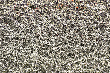 Sponge texture background. cleaning sponge material detail close up view. Dish washing or beauty care. Macro