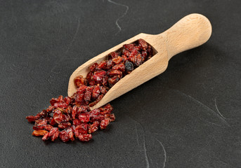 Dry barberry in scoop