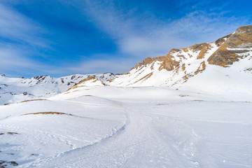 Fototapeta na wymiar Winter landscape on the First mountain in Swiss Alps in Grindelwald ski resort, Switzerland